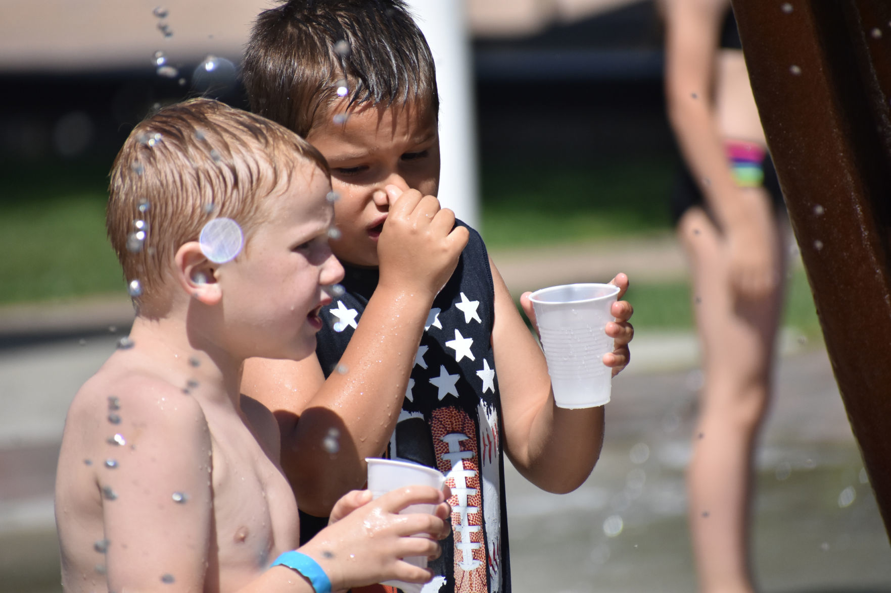 Jameson and Odie at splash pad